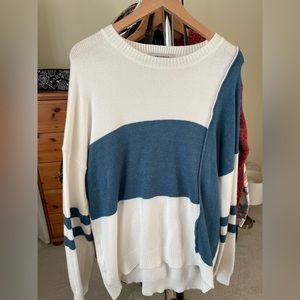 - Cute Sweater size Large. Only tried on once.